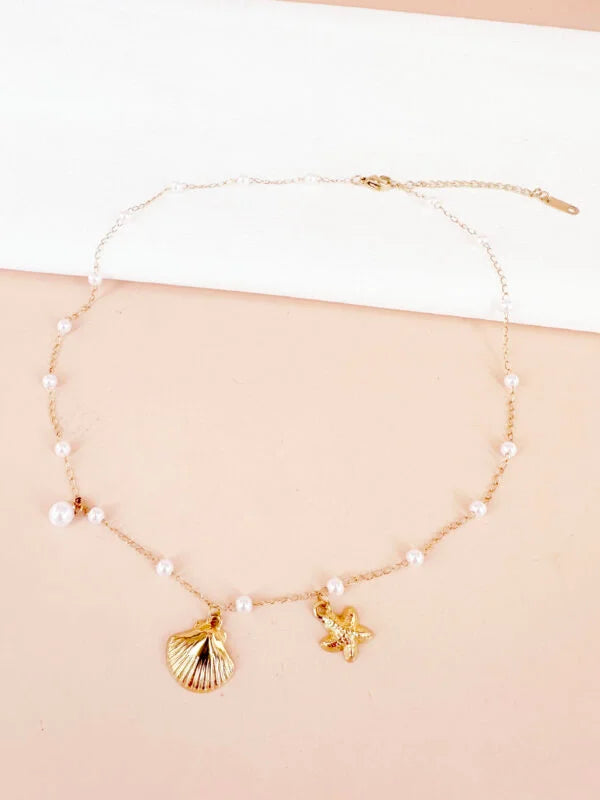 Collier perles avec coquillage et étoile: Ella
